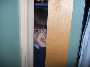 L. hiding in the pantry -- otherwise known as "I'm a mummy in my sarcophagus."