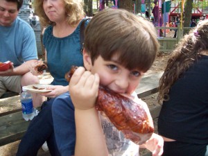 Child eating turkey leg